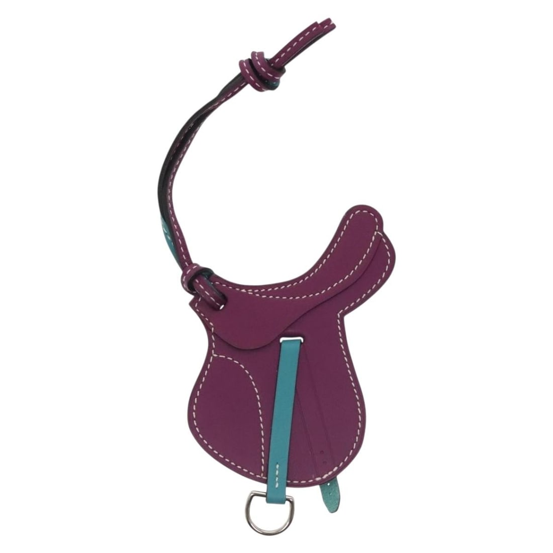 Purple Paddock Selle Bag Charm by Hermes: Purple Paddock Selle Bag Charm by Hermes This Hermes Paddock Selle bag charm features a purple design and is crafted for female use. The item is in excellent condition, with only slight rubbing on the