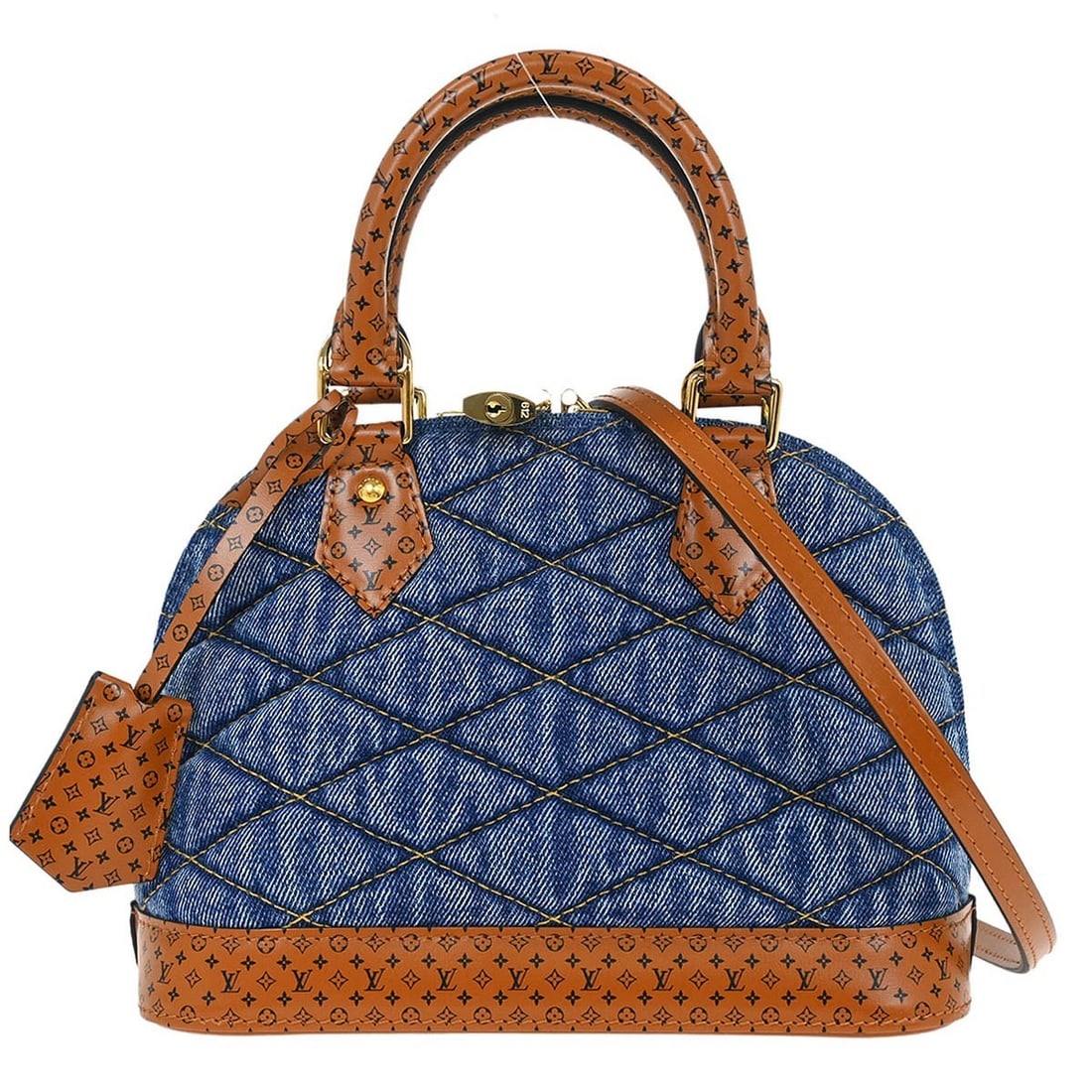 Louis Vuitton Alma BB Denim Malletage Blue Brown Pre-Owned Handbag: Louis Vuitton Alma BB Denim Malletage Blue Brown Pre-Owned Handbag This pre-owned Louis Vuitton Denim Malletage Alma BB handbag features a stylish blue and brown color combination. It is in very good