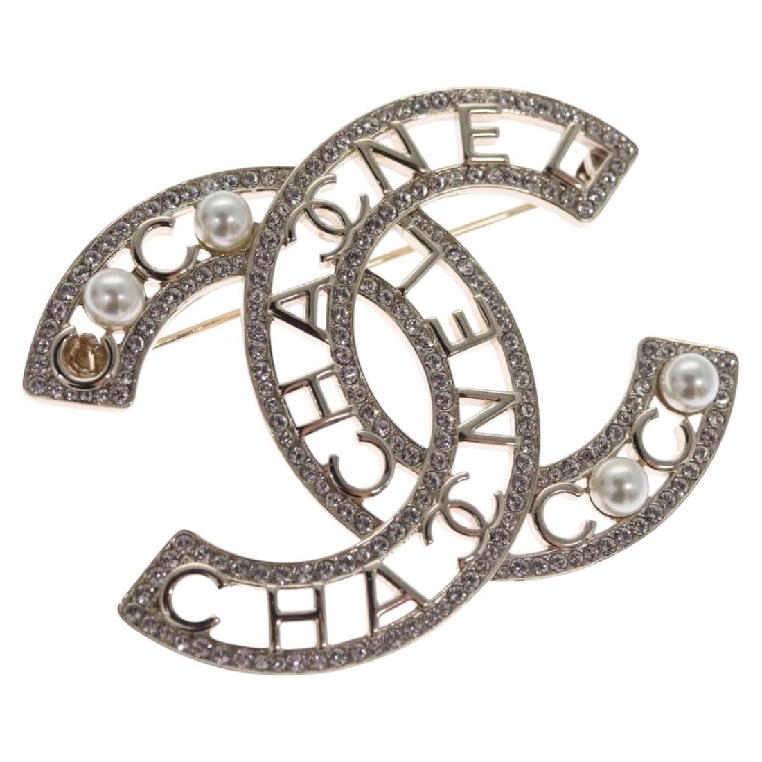CHANEL Coco CC Silver Metal Brooch with Dust Bag: CHANEL Coco CC Silver Metal Brooch with Dust Bag This exquisite CHANEL COCO Mark Brooch embodies timeless elegance with its sleek silver metal finish. Designed as a classic brooch, it showcases the ic