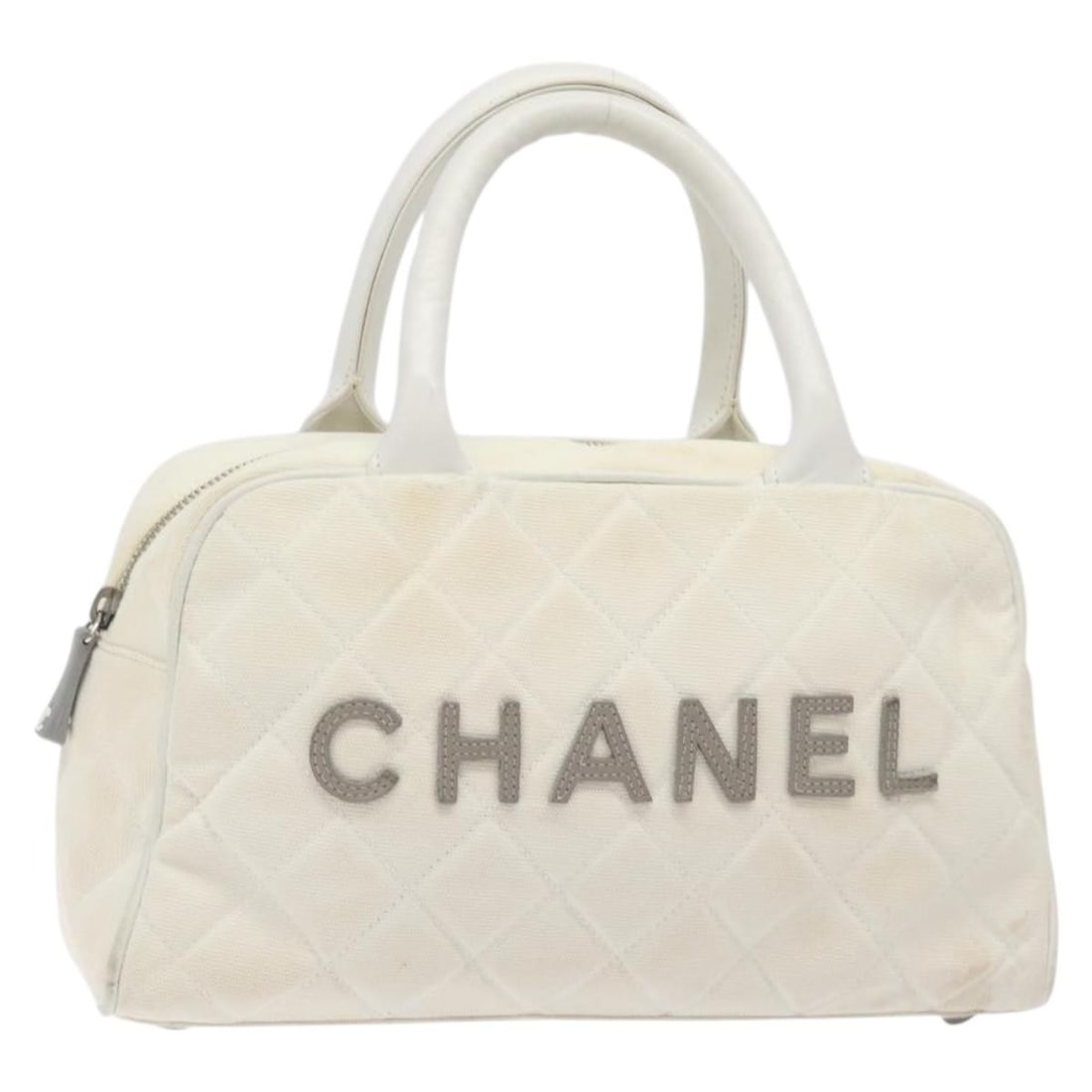White Vintage Bowler Purse by Chanel with Logo Accent: White Vintage Bowler Purse by Chanel with Logo Accent This is a Chanel vintage logo bowler bag in white, designed for women. The bag shows signs of gentle use including some loss of shape, rubbing, an