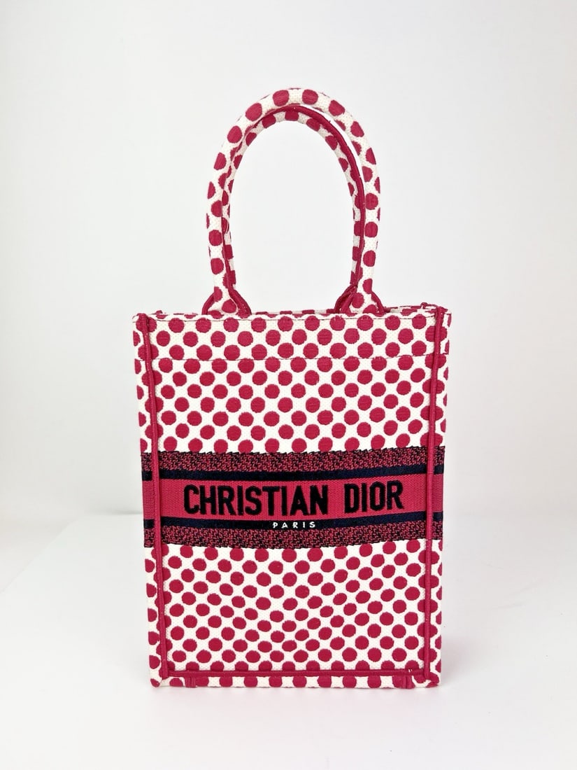 Dior Christian Amour Dots Canvas Tote Red Toile De Jouy: Dior Christian Amour Dots Canvas Tote Red Toile De Jouy Introducing the Christian Dior Canvas Dior Amour Dots Vertical Book Tote, a chic and stylish accessory perfect for casual travel. This small tot