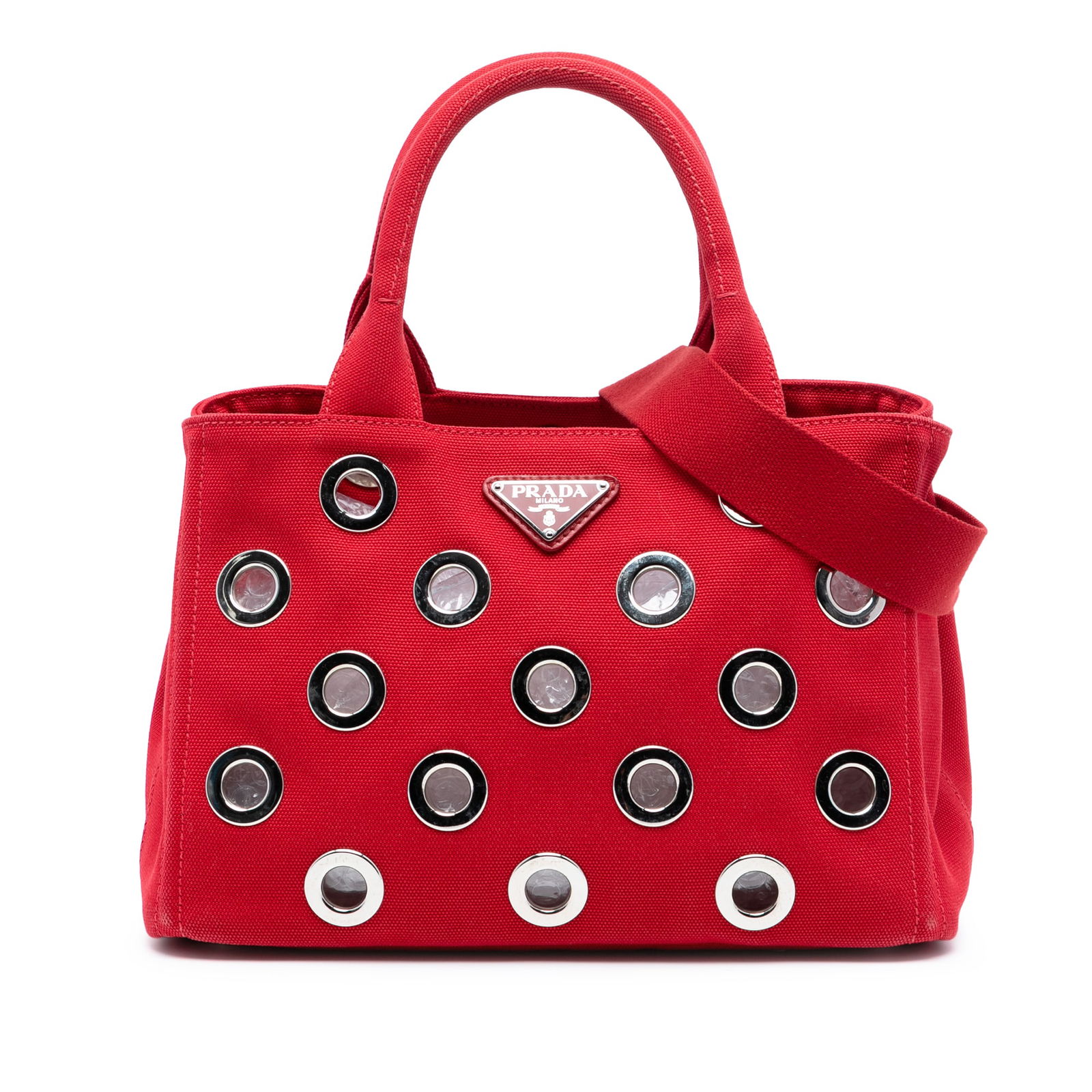 Prada Canapa Red Canvas Satchel with Grommet Detail and Shoulder Strap: Prada Canapa Red Canvas Satchel with Grommet Detail and Shoulder Strap This Prada Small Canvas Canapa Grommet Satchel features a perforated canvas body in red, rolled top handles, and a detachable, ad