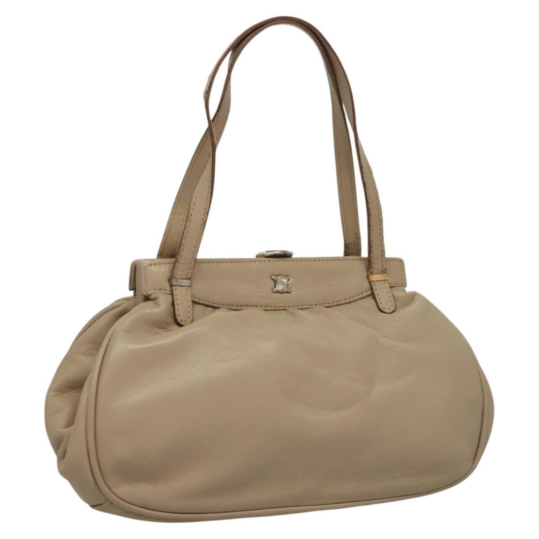Beige Celine Handbag with Metal Fittings and Dual Handles: Beige Celine Handbag with Metal Fittings and Dual Handles This pre-owned Celine handbag in beige is designed for women and displays significant signs of wear, including surface rubbing, a slightly mis