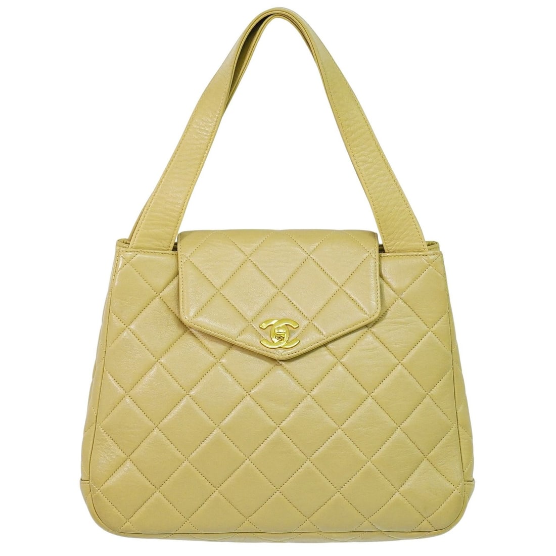 Beige Vintage Chanel Tote Bag Pre-Owned: Beige Vintage Chanel Tote Bag Pre-Owned This pre-owned Chanel vintage tote bag in beige features a classic design tailored for women. The bag shows signs of use, including some wear, stains, slight di