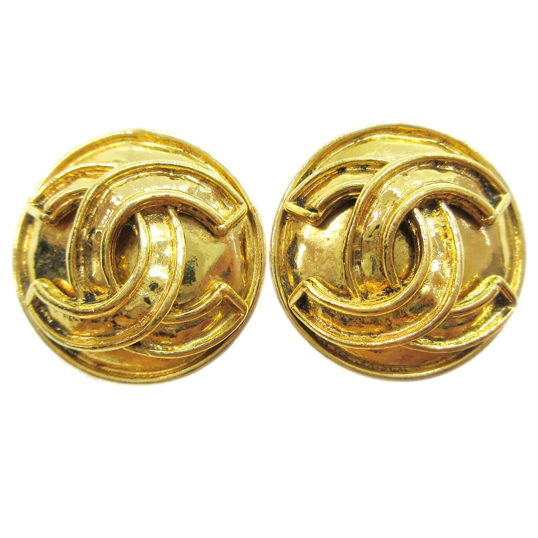 Gold Clip-On Earrings Featuring Chanel CC Emblem: Gold Clip-On Earrings Featuring Chanel CC Emblem These Chanel CC button clip-on earrings are designed for women and feature gold-tone accents. The earrings are in fair condition, showing some damages