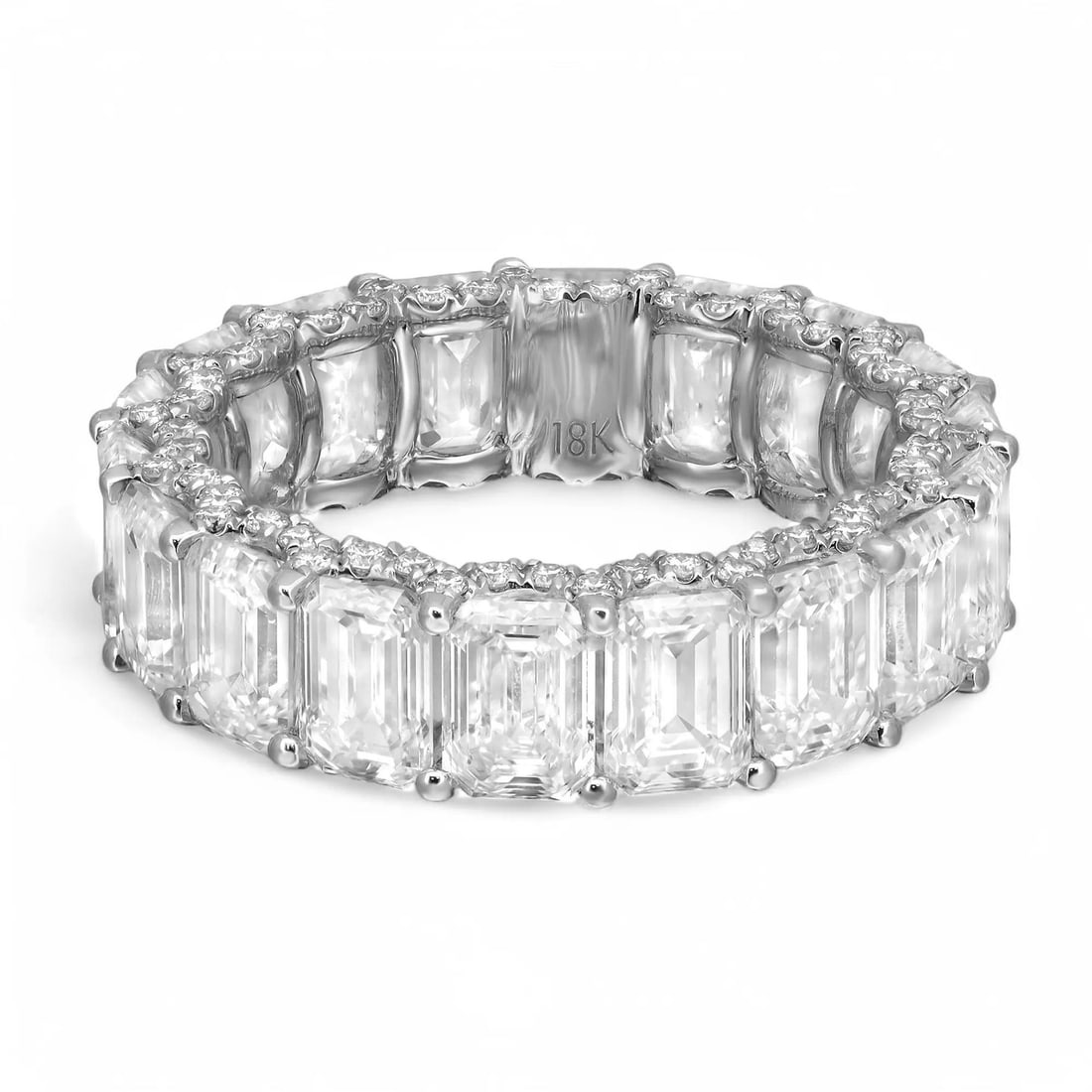 Rachel Koen 18K White Gold Lab Grown Diamond Eternity Band 8.75Ct: Rachel Koen 18K White Gold Lab Grown Diamond Eternity Band 8.75Ct This exquisite eternity band ring showcases a stunning array of 18 emerald cut lab grown diamonds, all elegantly set in a secure prong