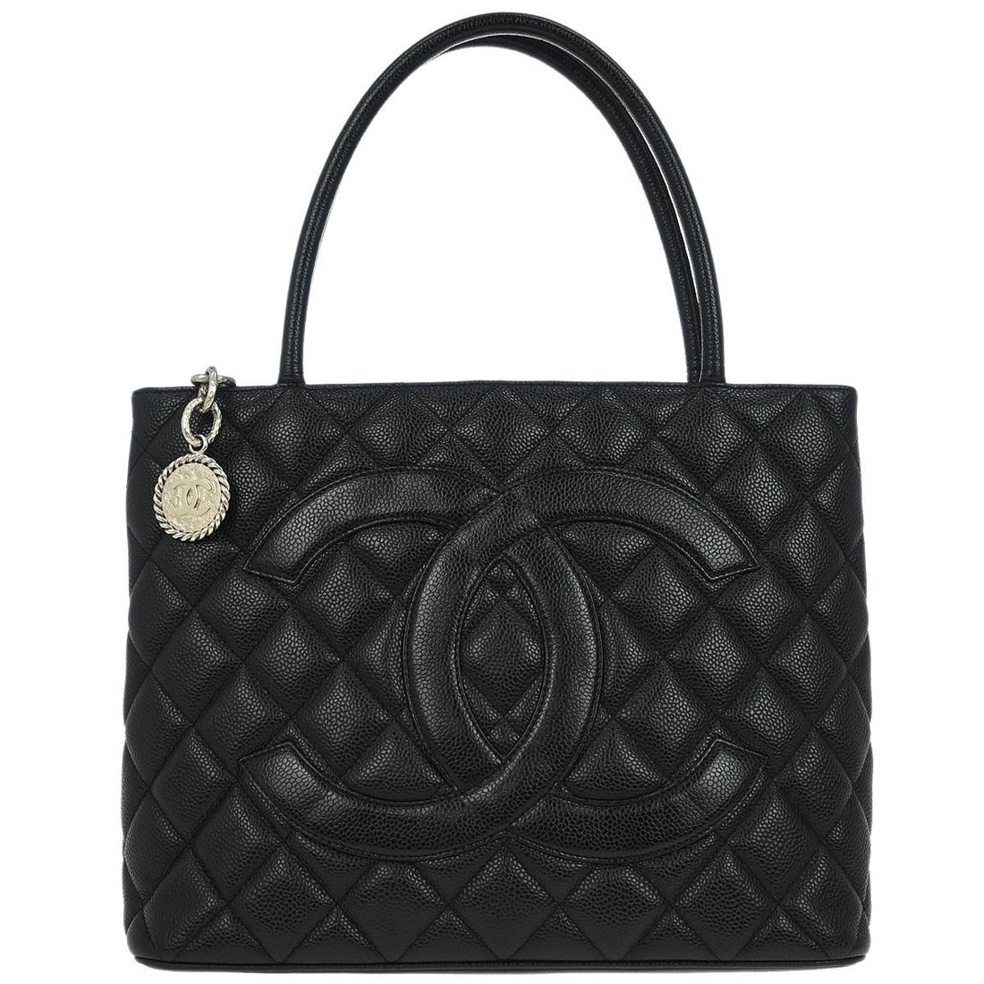 Black Chanel Medallion Tote Bag Pre-Owned: Black Chanel Medallion Tote Bag Pre-Owned This pre-owned Chanel Medallion Tote Bag features a classic black design and is in very good condition. There are minor stains in the pocket, but no odor is p