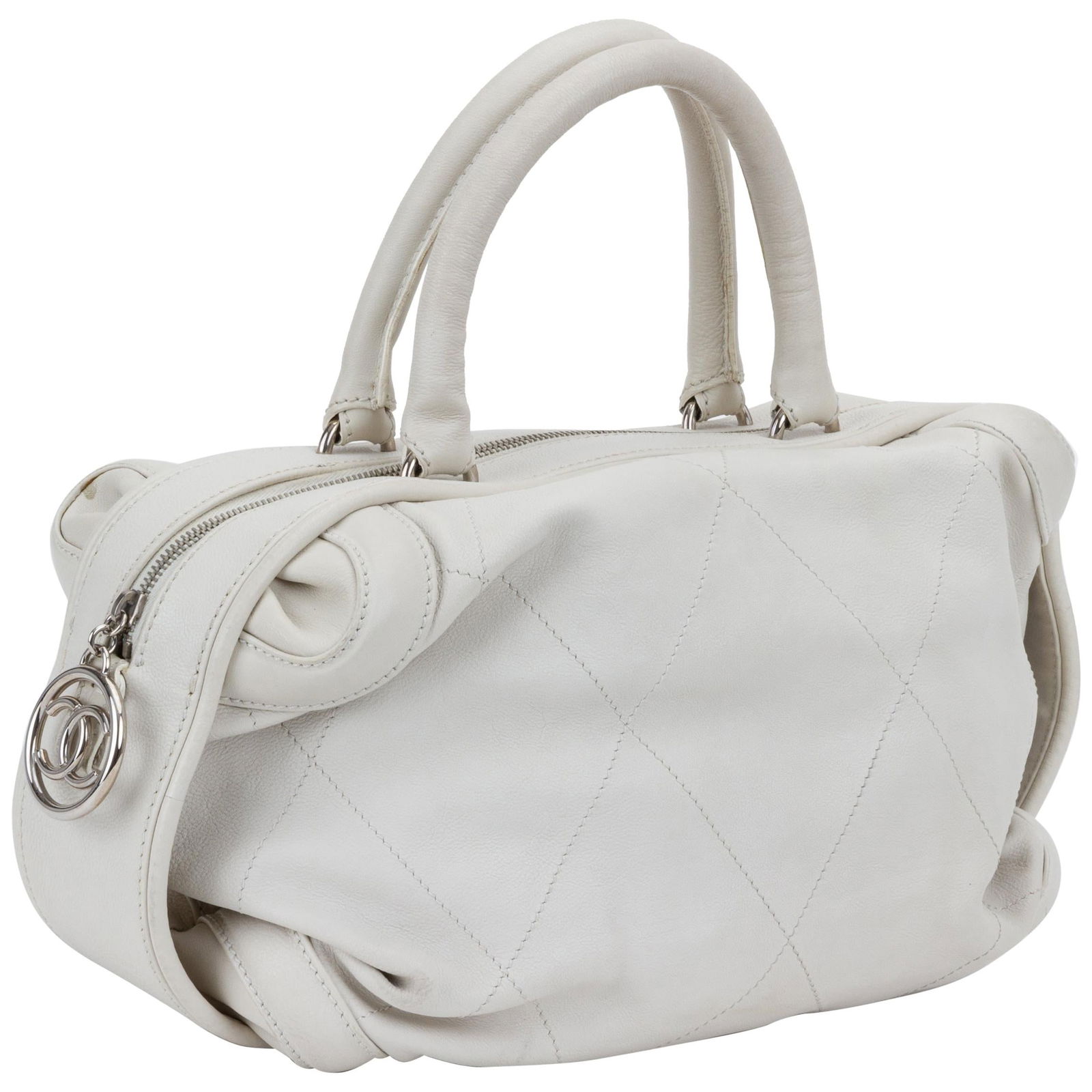 Chanel Ice White Bowler Bag Silver Tone Hardware Italy: Chanel Ice White Bowler Bag Silver Tone Hardware Italy Elevate your accessory collection with this exquisite Chanel Ice White Bowler Bag. Crafted from durable resistant leather, this elegant bag featu