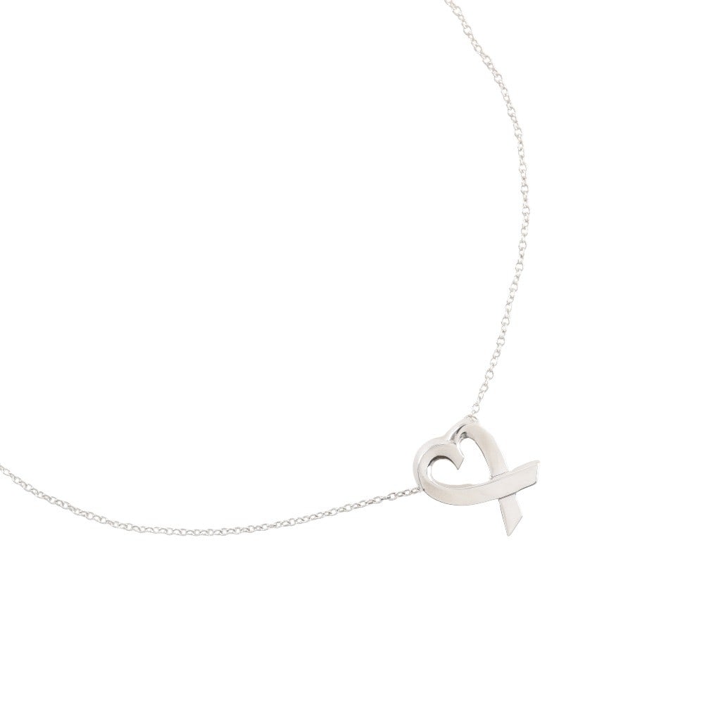 Paloma Picasso Loving Heart Silver Necklace from Tiffany & Co.: Paloma Picasso Loving Heart Silver Necklace from Tiffany & Co. This Tiffany & Co. Paloma Picasso Loving Heart pendant necklace features a polished silver finish and is designed for women. It is in pri