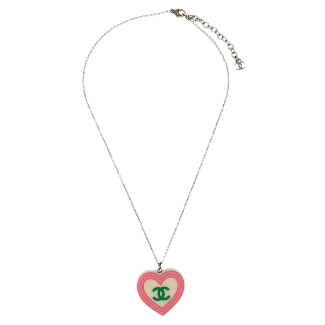 Chanel Silver Necklace with CC Heart Shaped Pendant: Chanel Silver Necklace with CC Heart Shaped Pendant Chanel CC Heart pendant necklace in silver tone, designed for women. The necklace is in very good condition with minor signs of use, including sligh