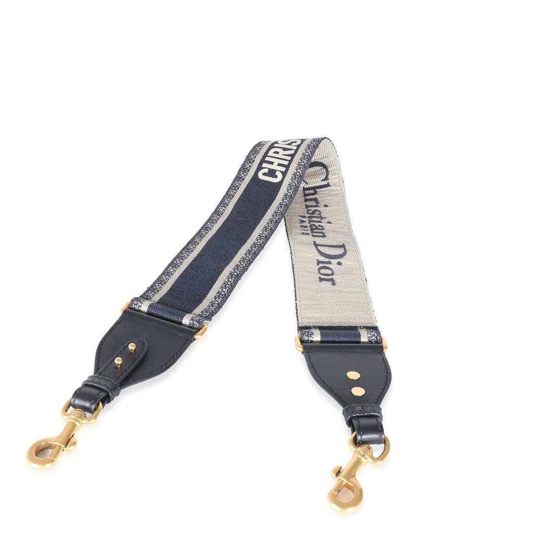 Christian Dior Navy Blue Embroidered Adjustable Bag Strap with Gold-Tone Hardware: Christian Dior Navy Blue Embroidered Adjustable Bag Strap with Gold-Tone Hardware Enhance your handbag with this Christian Dior Navy Logo Embroidered Adjustable Shoulder Strap. Crafted in Italy, this