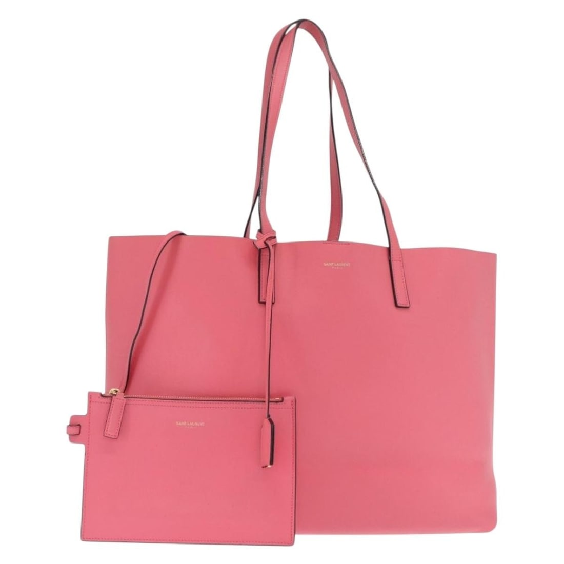 Pink Leather Saint Laurent Tote with Gold Accents and Pouch: Pink Leather Saint Laurent Tote with Gold Accents and Pouch This Saint Laurent Sac Shopping tote bag is crafted from pink leather with gold-tone accents. Made in Italy, the bag features a spacious int