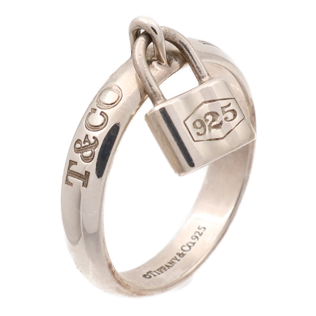 Silver 925 Ring by Tiffany US Size 6.75: Silver 925 Ring by Tiffany US Size 6.75 This Tiffany & Co. ring is crafted from 925 sterling silver and features a classic design without a main stone. The ring is a US size 6.75 and is in very good,