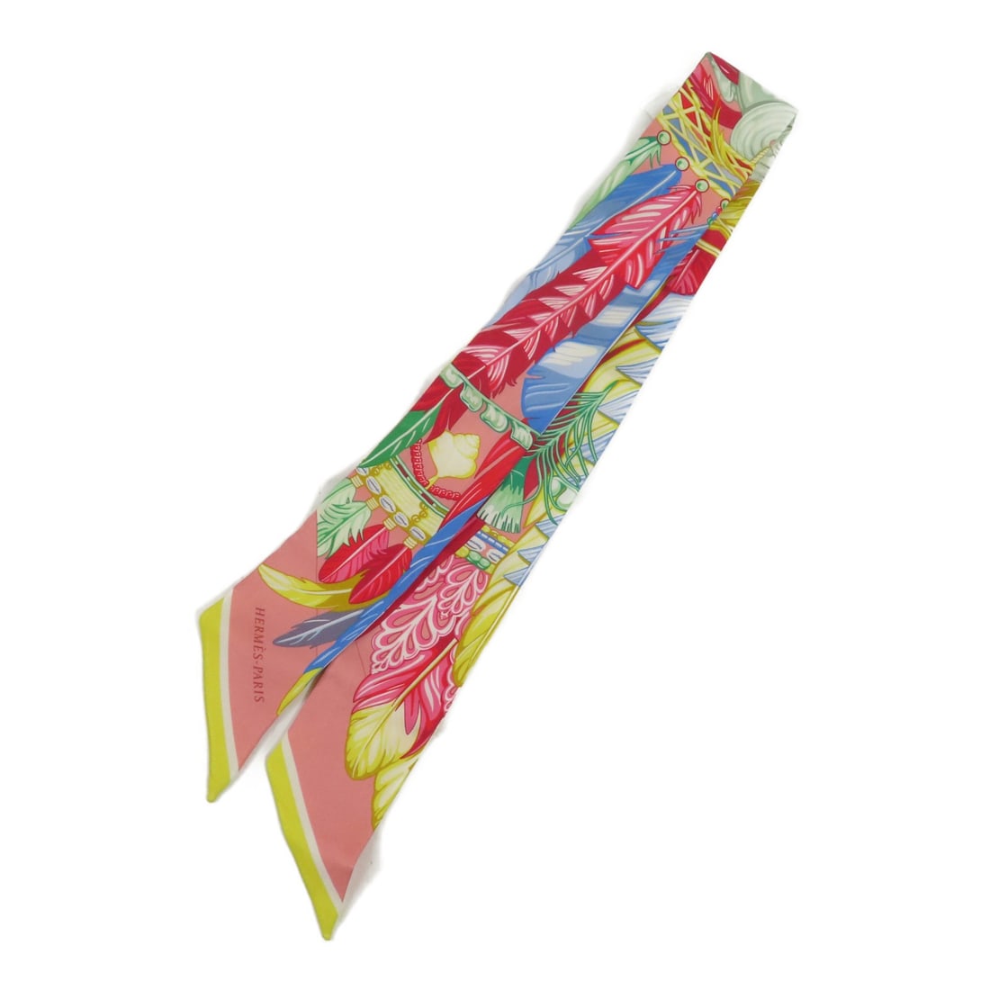 HERMES Multicolor Silk Twilly Scarf Made in France: HERMES Multicolor Silk Twilly Scarf Made in France This exquisite HERMES Twilly Scarf is a versatile accessory crafted from luxurious silk, showcasing a vibrant multicolor design. Perfect for adding a