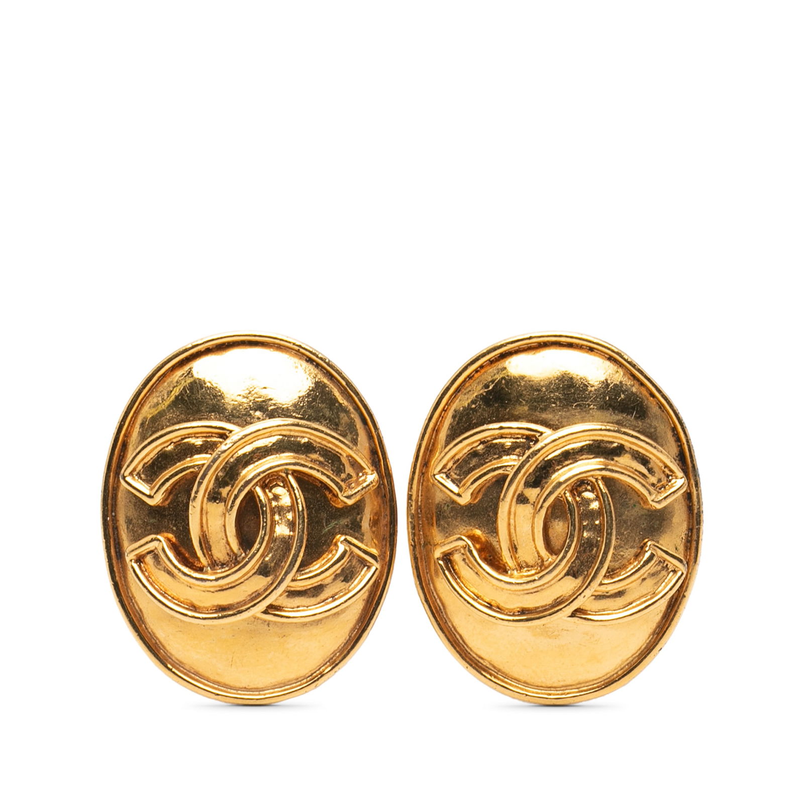 Chanel Gold Plated CC Oval Clip On Earrings France: Chanel Gold Plated CC Oval Clip On Earrings France Elevate your accessory collection with these Chanel Gold Plated CC Oval Clip On Earrings. Designed with a gold-tone metal body, these earrings showca