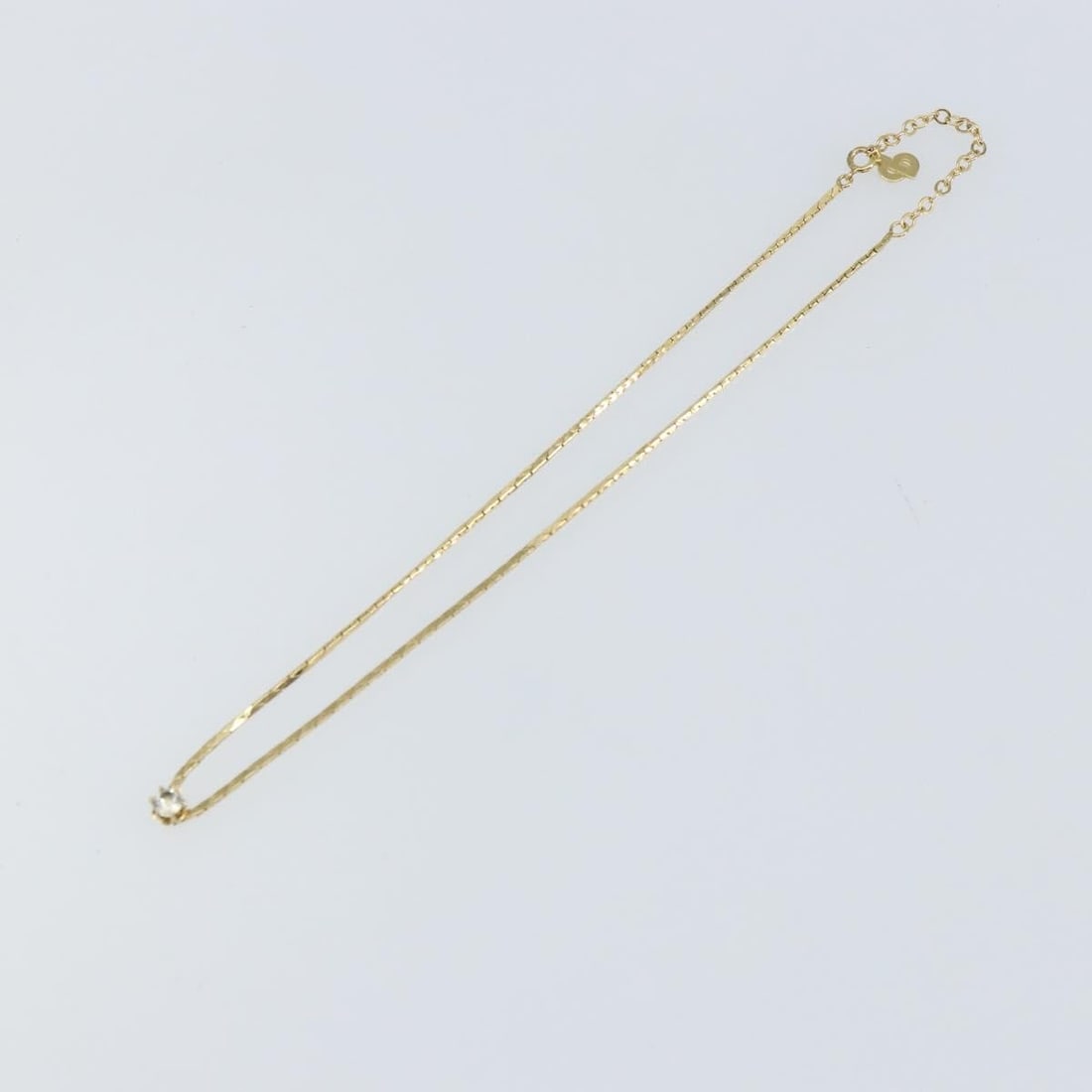Christian Dior gold tone CD logo pendant necklace: Christian Dior gold tone CD logo pendant necklace This pre-owned Christian Dior necklace features the iconic CD logo and is designed for women. The necklace is in very good condition with minor surfac