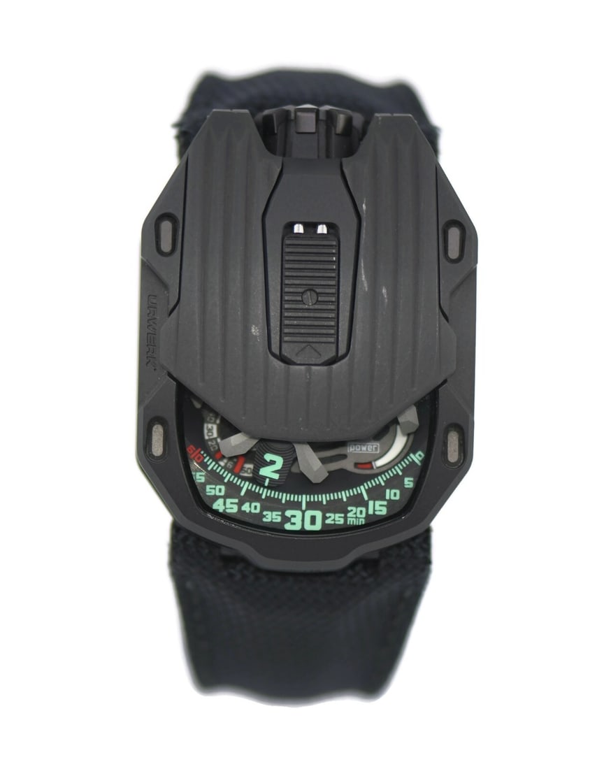 URWERK Kryptonite UR105CT Black Titanium Automatic Watch with Box and Papers: URWERK Kryptonite UR105CT Black Titanium Automatic Watch with Box and Papers Discover the unique allure of the Urwerk Kryptonite Black Titanium Watch, model UR105CT. This innovative wristwatch feature