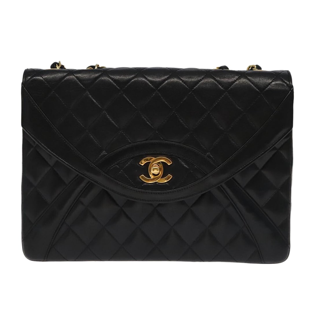 Black Two Tone Envelope Flap Bag by Chanel Vintage: Black Two Tone Envelope Flap Bag by Chanel Vintage This Chanel Vintage Two Tone Envelope Flap Bag features a black exterior with an envelope-style flap closure. The bag shows signs of gentle use, incl