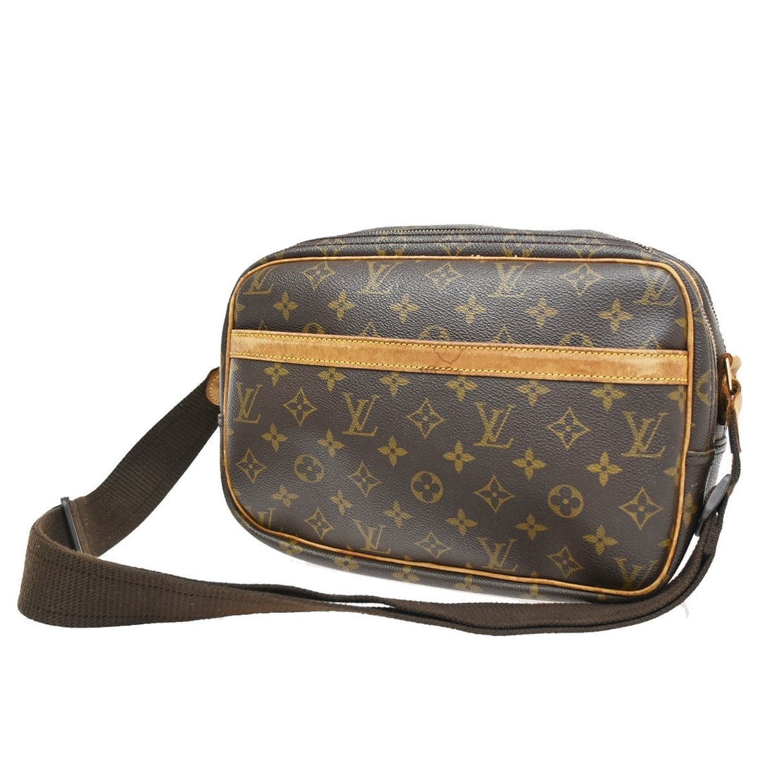 Reporter Shoulder Bag by Louis Vuitton in Brown Monogram Canvas: Reporter Shoulder Bag by Louis Vuitton in Brown Monogram Canvas This pre-owned Louis Vuitton Reporter shoulder bag features a brown exterior and is designed for female use. It shows noticeable signs o