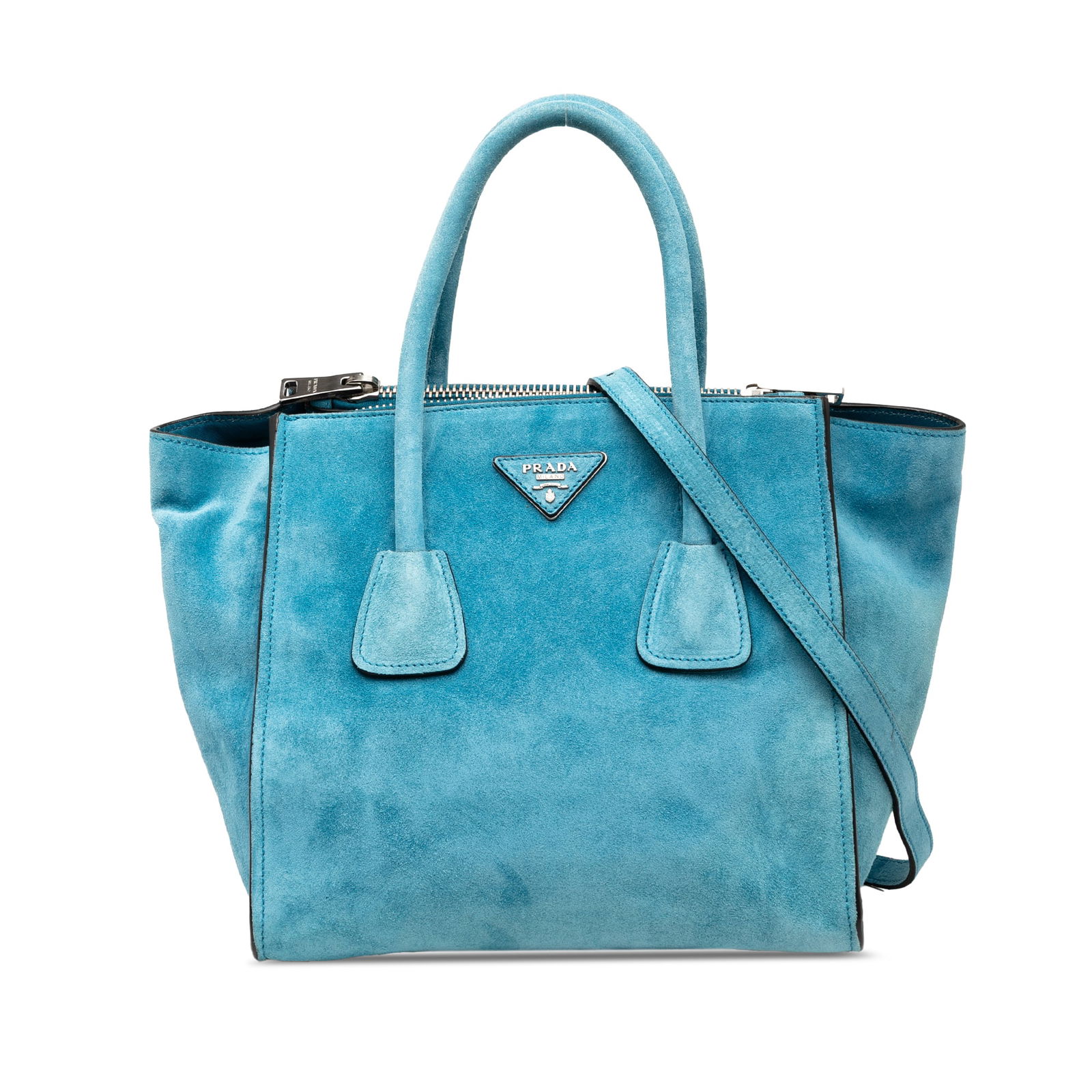 Prada Small Blue Suede Twin Pocket Satchel with Leather Strap: Prada Small Blue Suede Twin Pocket Satchel with Leather Strap Introducing the Prada Small Scamosciato Twin Pocket Satchel, a stylish bag that combines practicality with luxury. This satchel features a