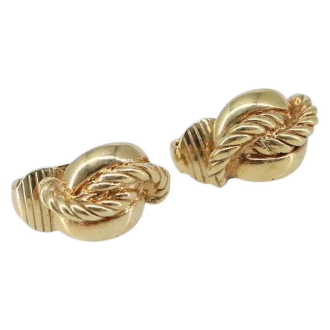 Gold Tone Metal Earrings by Christian Dior: Gold Tone Metal Earrings by Christian Dior These Christian Dior earrings feature a gold-toned metal design. They are in reasonable used condition with slight surface scratches. Item does not include a