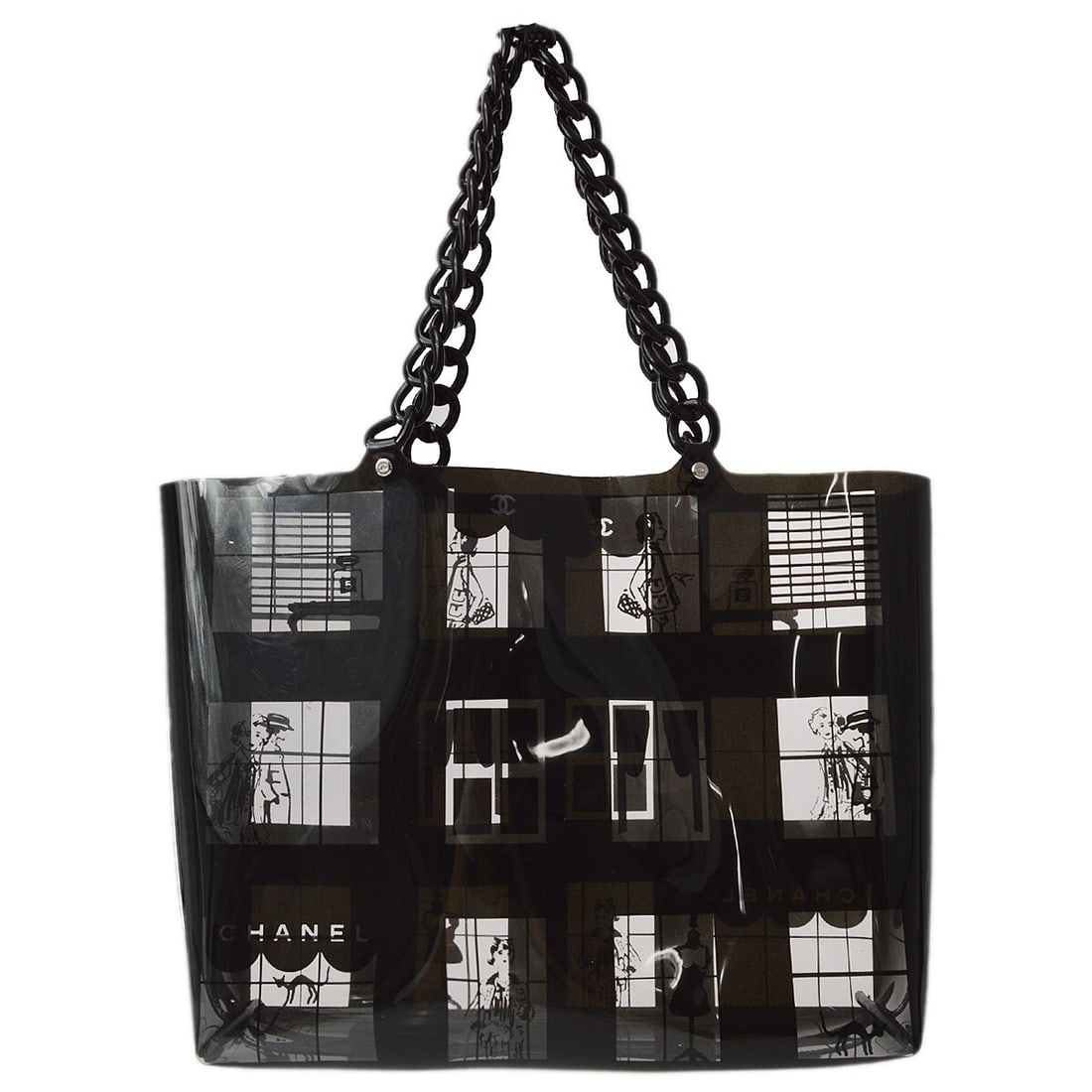 Coco Window Tote Bag by Chanel in Black and Clear: Coco Window Tote Bag by Chanel in Black and Clear This Chanel Coco Window Tote is crafted in black and clear materials and designed for women. The bag is in good condition with minor signs of use, inc
