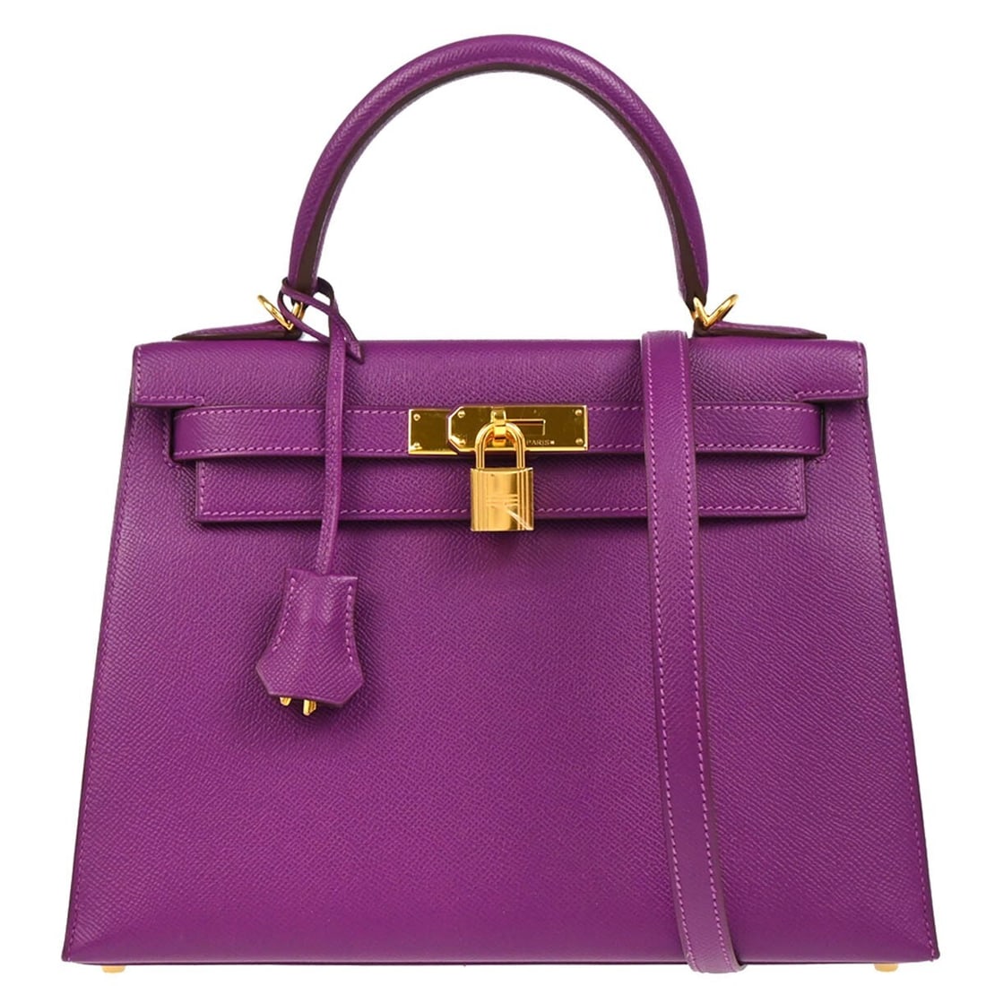 Hermes Kelly Anemone Purple Handbag: Hermes Kelly Anemone Purple Handbag This Hermes Kelly handbag features a striking purple Anemone color. Crafted for women, the bag presents a classic and elegant design. The exterior is in great condi