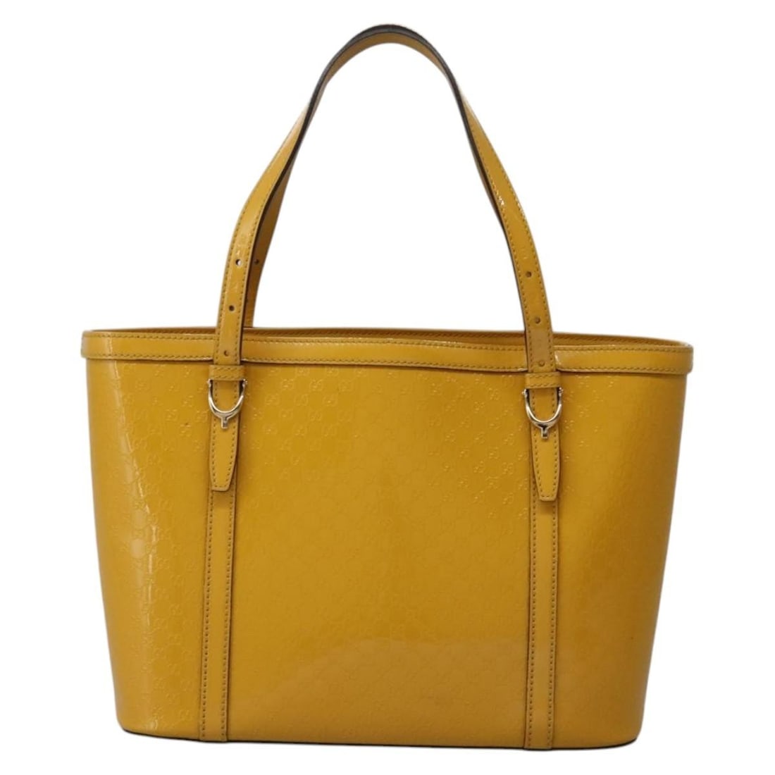 Nice Tote Bag in Yellow by Gucci: Nice Tote Bag in Yellow by Gucci This pre-owned Gucci Nice Tote in yellow is in good condition, with minor signs of wear such as slight shape loss, rubbing, and sun exposure on the exterior. The handl