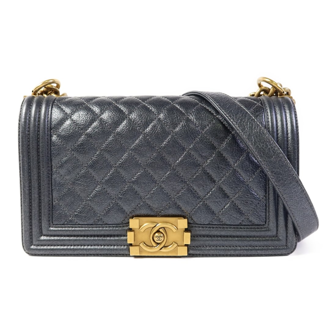 CHANEL Boy 25 Chain Shoulder Bag GHW Calfskin Leather Blue: CHANEL Boy 25 Chain Shoulder Bag GHW Calfskin Leather Blue This exquisite CHANEL Boy 25 Chain Shoulder Bag is crafted from luxurious calfskin leather in a stunning metallic blue hue. Designed for eleg