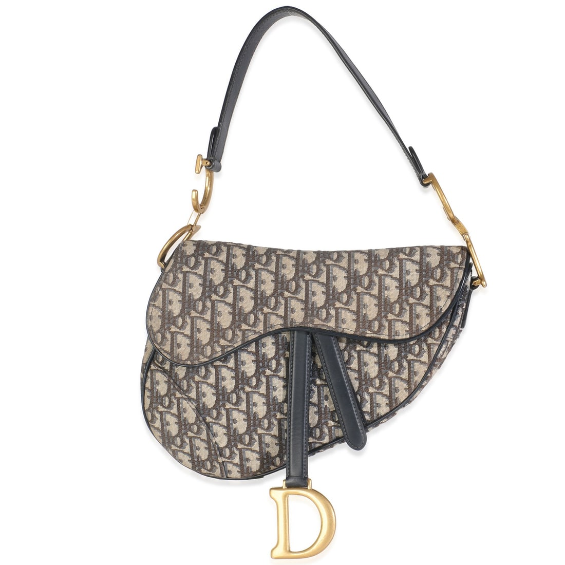 Dior Medium Saddle Shoulder Bag in Blue Oblique Canvas: Dior Medium Saddle Shoulder Bag in Blue Oblique Canvas This Christian Dior Medium Saddle Bag features blue Oblique jacquard canvas with beige and blue exterior accents. The bag is designed in a classi