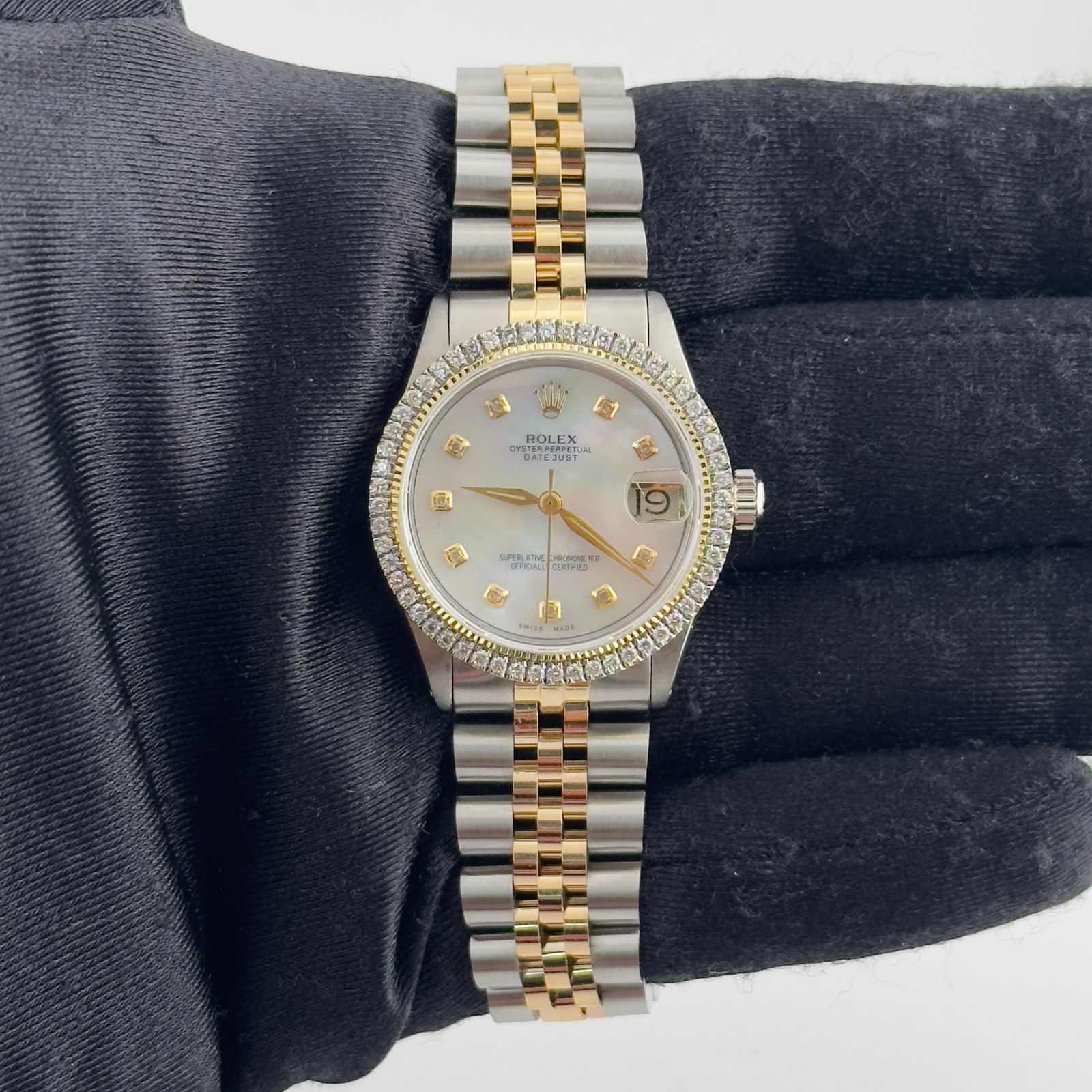 Ladies Datejust 6517 Watch with Aftermarket White MOP Diamond Dial Jubilee Bracelet: Ladies Datejust 6517 Watch with Aftermarket White MOP Diamond Dial Jubilee Bracelet This ladies Rolex Datejust features an aftermarket white mother of pearl dial set with diamonds, complemented by an