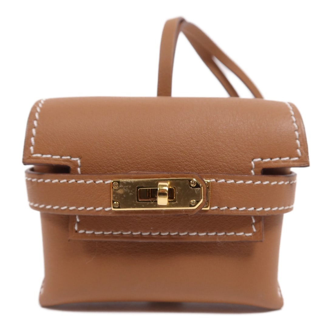 HERMES Gold GHW Kelly Festival Charm in Swift Leather: HERMES Gold GHW Kelly Festival Charm in Swift Leather Enhance your collection with this exquisite HERMES Kelly Festival Charm, crafted from luxurious calfskin leather in a stunning gold hue. This char