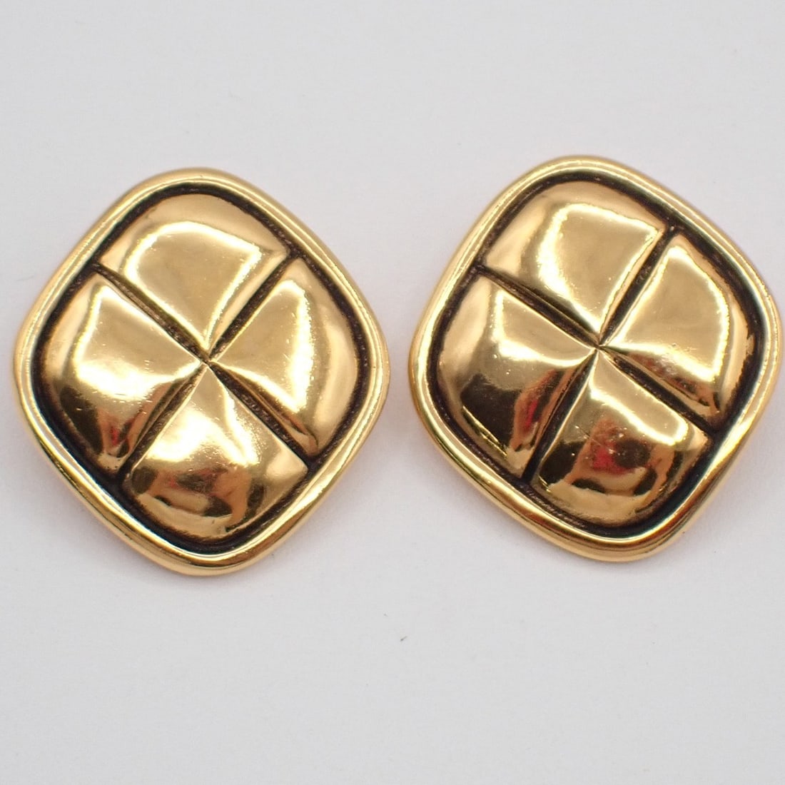 Vintage Chanel Gold Tone CC Logo Rhombus Clip Earrings: Vintage Chanel Gold Tone CC Logo Rhombus Clip Earrings These vintage Chanel CC rhombus clip-on earrings feature a gold-tone finish and are designed for women. They are in very good condition, with som