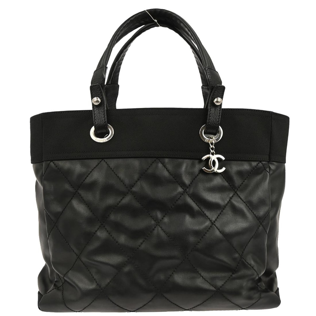 Paris-Biarritz MM Black Canvas Large Tote by Chanel: Paris-Biarritz MM Black Canvas Large Tote by Chanel This Chanel Paris-Biarritz MM Tote Handbag features a black coated canvas and leather exterior with the iconic logo accent. The large-sized tote is