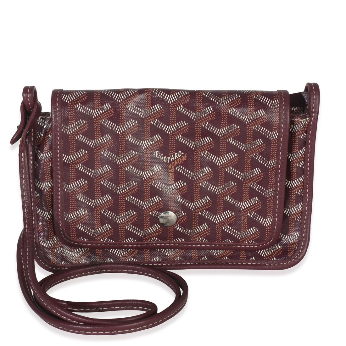 Plumet Wallet in Burgundy Goyardine Canvas with Silver Tone Hardware: Plumet Wallet in Burgundy Goyardine Canvas with Silver Tone Hardware This Goyard Plumet Wallet features burgundy Goyardine canvas with a snap closure and silver-tone hardware. Designed for versatility