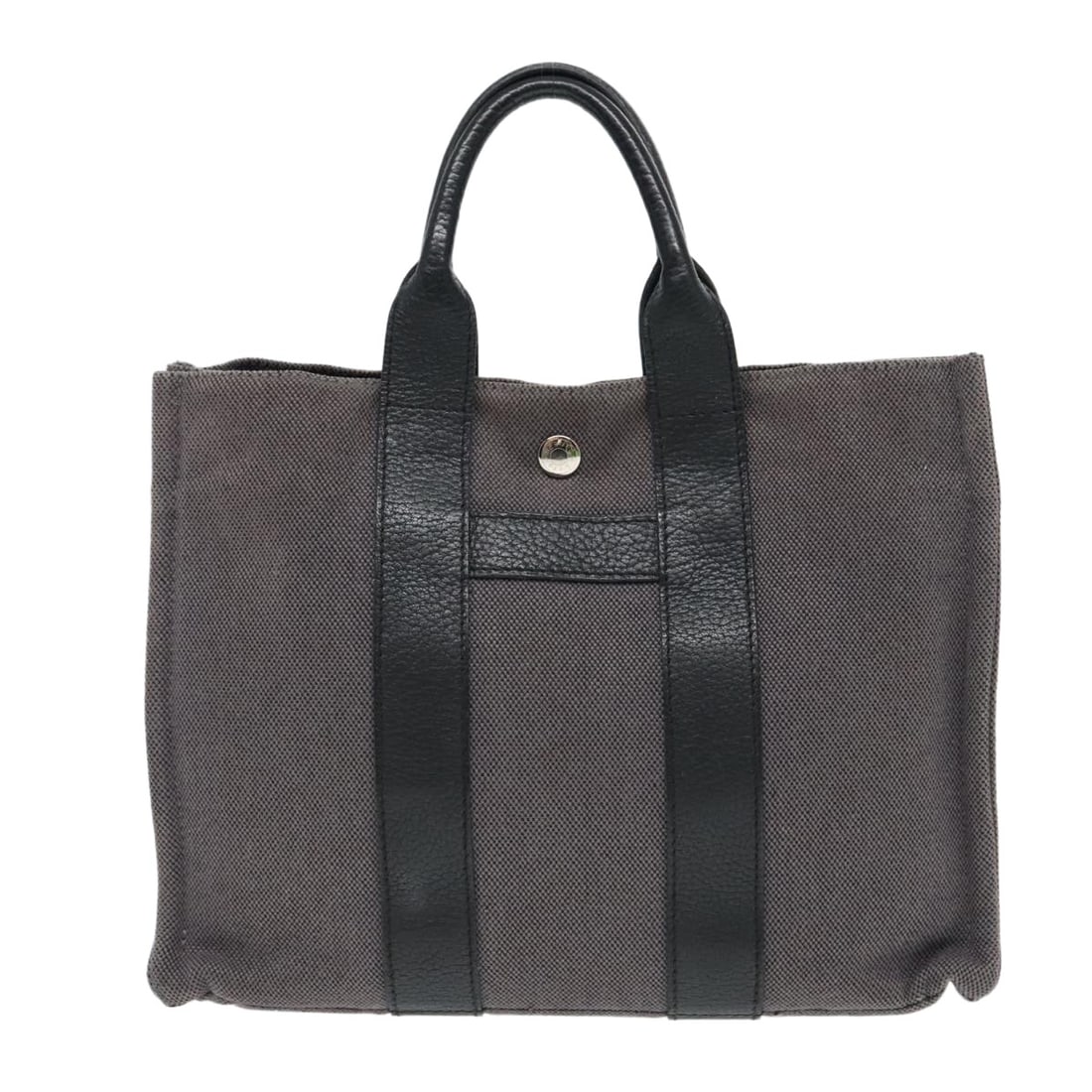 Gray Harnais Tote Bag by Hermes: Gray Harnais Tote Bag by Hermes This Hermes Sac Harnais tote in gray features a structured silhouette with a spacious interior. The exterior shows some signs of wear, including rubbing and being out o