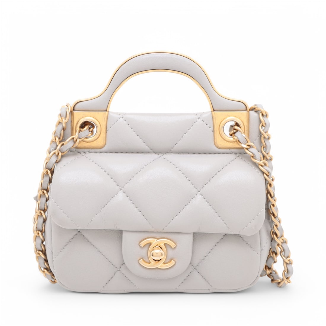 Chanel Card Holder Shoulder Bag with Top Handle and Chain Strap: Chanel Card Holder Shoulder Bag with Top Handle and Chain Strap This pre-owned Chanel Lady Handle Flap Card Holder on Chain is a shoulder bag designed for female use. It features a flap closure and a