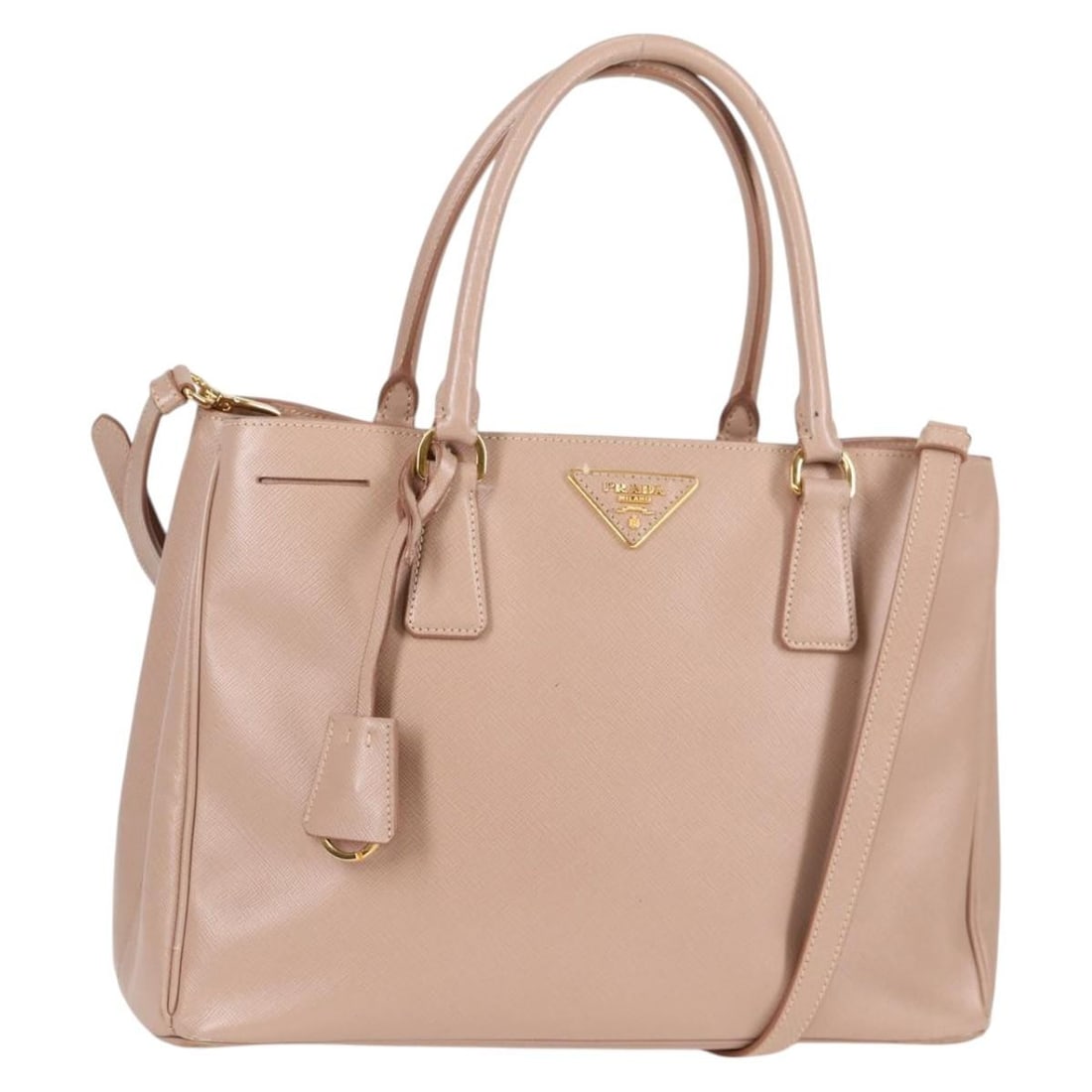 Pink Gardener's Tote Bag by Prada for Women: Pink Gardener's Tote Bag by Prada for Women This Prada Gardener's Tote in pink is a stylish handbag designed for women. The bag shows some signs of use, including slight rubbing on the exterior surfac