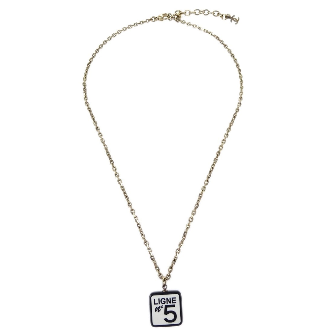 Chanel No.5 Pendant Necklace in Gold and White with CC Logo: Chanel No.5 Pendant Necklace in Gold and White with CC Logo This Chanel CC No.5 pendant necklace features gold and white tones, offering a refined accessory suitable for women. The necklace is in very