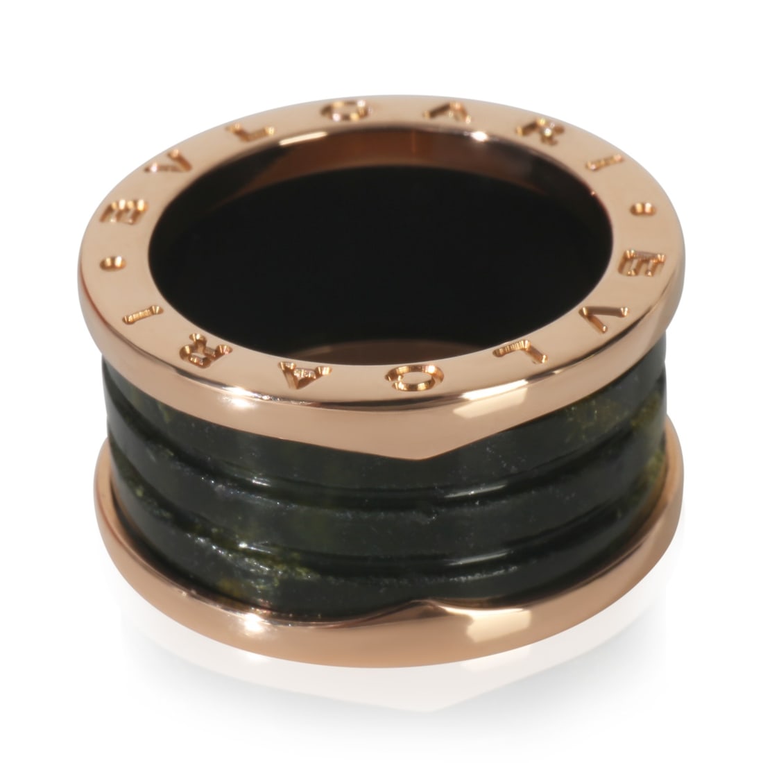 18k Rose Gold B.zero1 Marble Ring by BVLGARI Size 7.25: 18k Rose Gold B.zero1 Marble Ring by BVLGARI Size 7.25 This BVLGARI B.zero1 Marble ring is crafted from 18k rose gold and features a distinctive pink hue. Part of the B.zero1 Marble collection, the ri