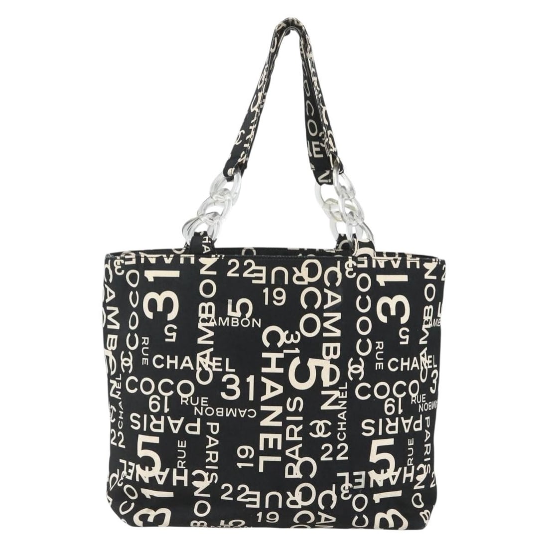 31 Rue Cambon Black Beach Tote Bag by Chanel: 31 Rue Cambon Black Beach Tote Bag by Chanel This pre-owned Chanel 31 Rue Cambon Beach Zip Tote is crafted in black and is designed for women. The tote shows signs of use, including surface rubbing, s