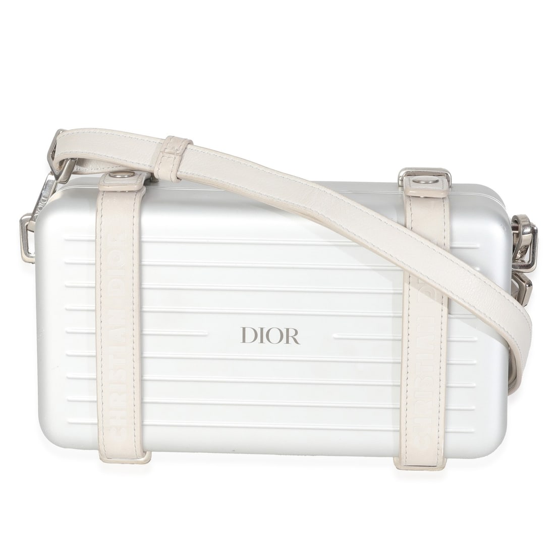 RIMOWA x Dior Aluminum Personal Clutch with Removable Strap: RIMOWA x Dior Aluminum Personal Clutch with Removable Strap This Christian Dior x RIMOWA Personal Clutch On Strap is crafted from silver aluminum with a gray leather lining. Designed in Germany, it fe