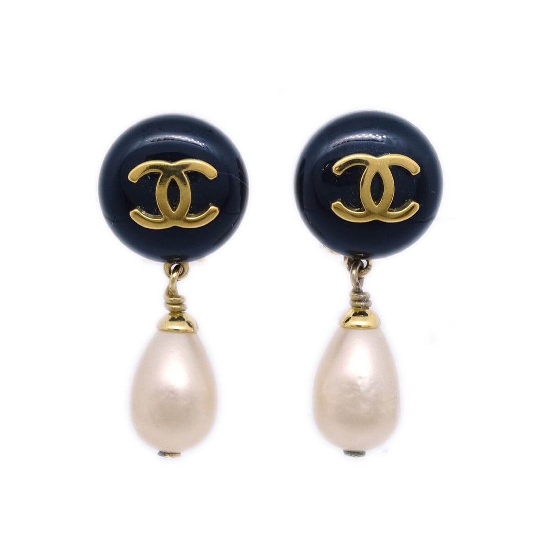 Gold Black White CC Drop Earrings by Chanel: Gold Black White CC Drop Earrings by Chanel These Chanel CC dangle earrings feature a striking color combination of gold, black, and white. Designed for women, the earrings are in very good, un-used c