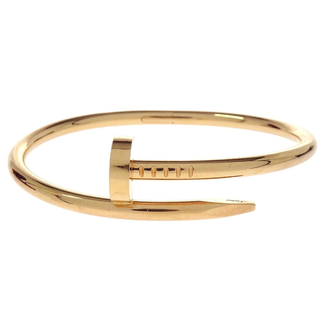 Juste Un Clou Gold Bangle Bracelet by Cartier Size 15 Au750: Juste Un Clou Gold Bangle Bracelet by Cartier Size 15 Au750 This is a Cartier Juste Un Clou bangle bracelet crafted from 18k gold. The bracelet features a sleek, nail-inspired design with a gold finis