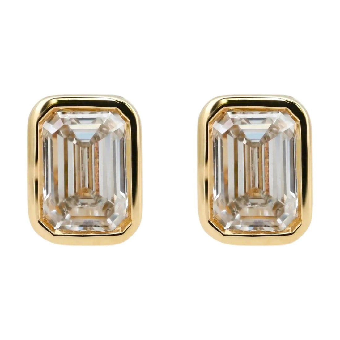 3.25ct Lab Grown Emerald Cut Diamond Studs in 14K Yellow Gold Bezel Setting: 3.25ct Lab Grown Emerald Cut Diamond Studs in 14K Yellow Gold Bezel Setting These bezel set stud earrings feature emerald cut lab grown diamonds, crafted in high polished 14k yellow gold. The earrings