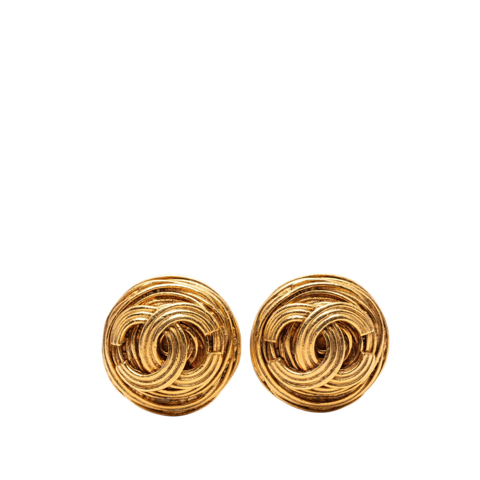 Chanel Round Gold Tone CC Logo Clip Earrings: Chanel Round Gold Tone CC Logo Clip Earrings These Chanel clip-on earrings feature a round silhouette crafted from gold-plated metal. The earrings showcase the iconic CC logo and are designed with a c