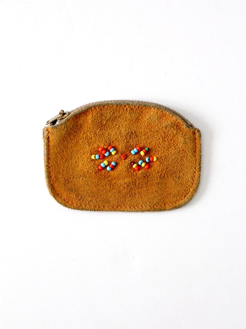 Vintage Suede Coin Purse with Beaded Southwest Design: Vintage Suede Coin Purse with Beaded Southwest Design This vintage suede coin purse showcases a charming beaded design, adorned with hand-sewn red, blue, and yellow beads that create an eye-catching s