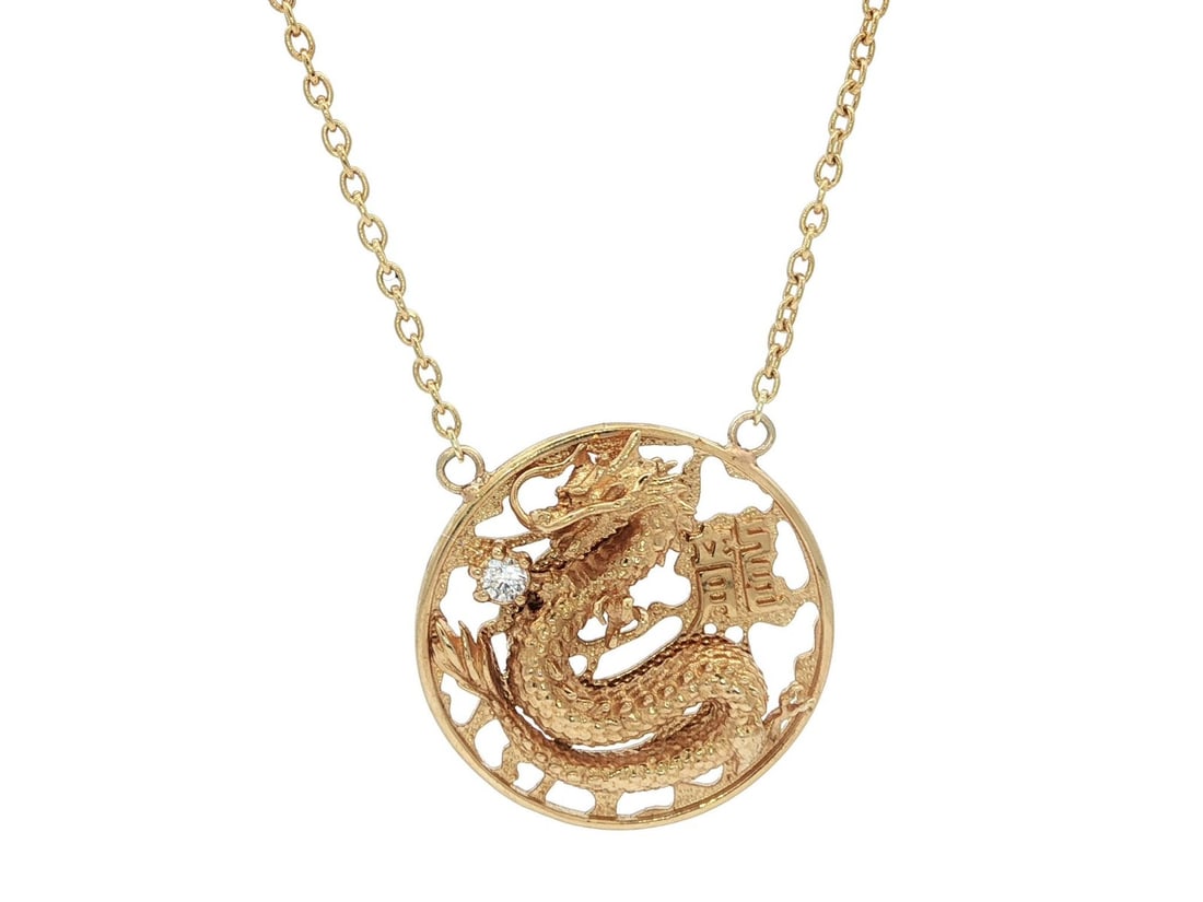 18k Yellow Gold Adjustable Dragon Pendant with Diamond: 18k Yellow Gold Adjustable Dragon Pendant with Diamond This exquisite pendant features a stunning Chinese dragon design crafted from solid 18k yellow gold, showcasing a brilliant round diamond in a pr