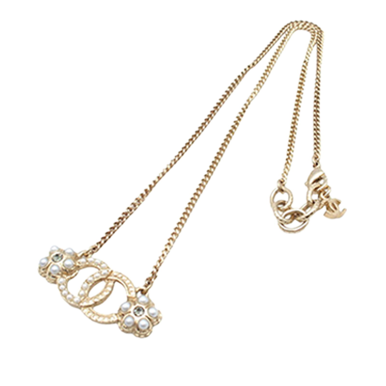 Faux Pearl and Rhinestone Flower Necklace by Chanel Gold Plated Metal: Faux Pearl and Rhinestone Flower Necklace by Chanel Gold Plated Metal This Chanel necklace features a gold-plated metal body adorned with faux pearl and rhinestone embellishments in a floral motif. Th