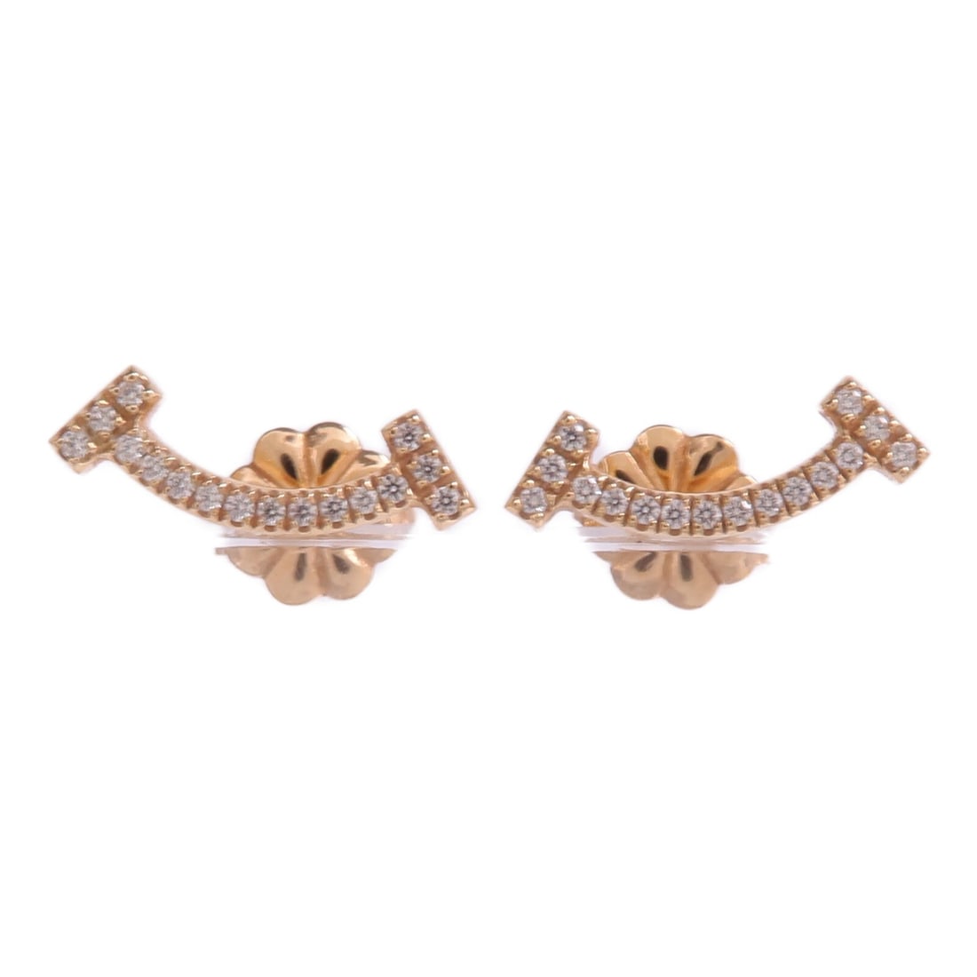 T Smile Mini Diamond Earrings in 18K Rose Gold by Tiffany and Co: T Smile Mini Diamond Earrings in 18K Rose Gold by Tiffany and Co These Tiffany & Co. T Smile Mini pierced earrings are crafted from 18K rose gold and adorned with diamonds. Made in the United States,